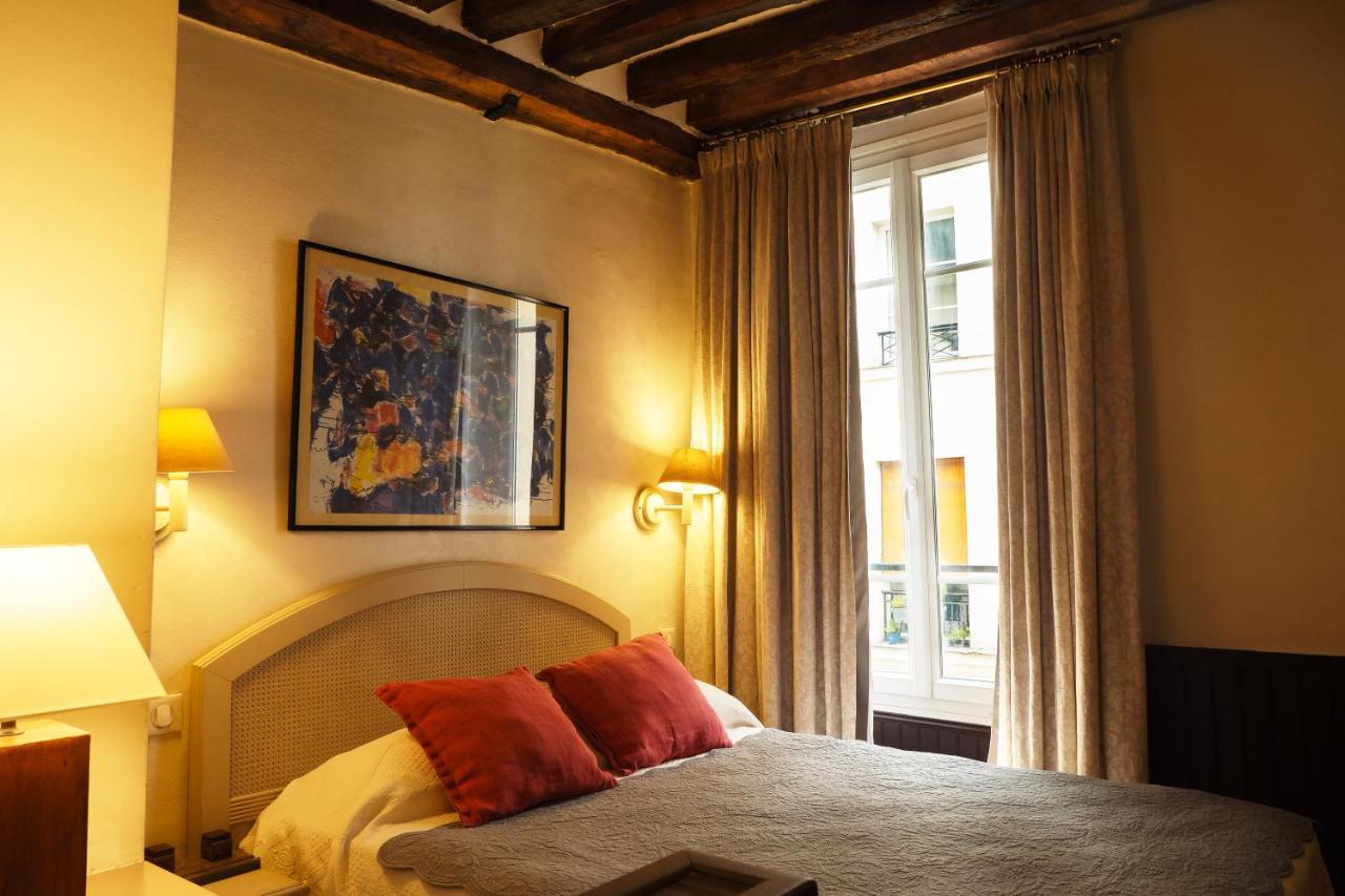 Hotel Du Cygne Париж Экстерьер фото